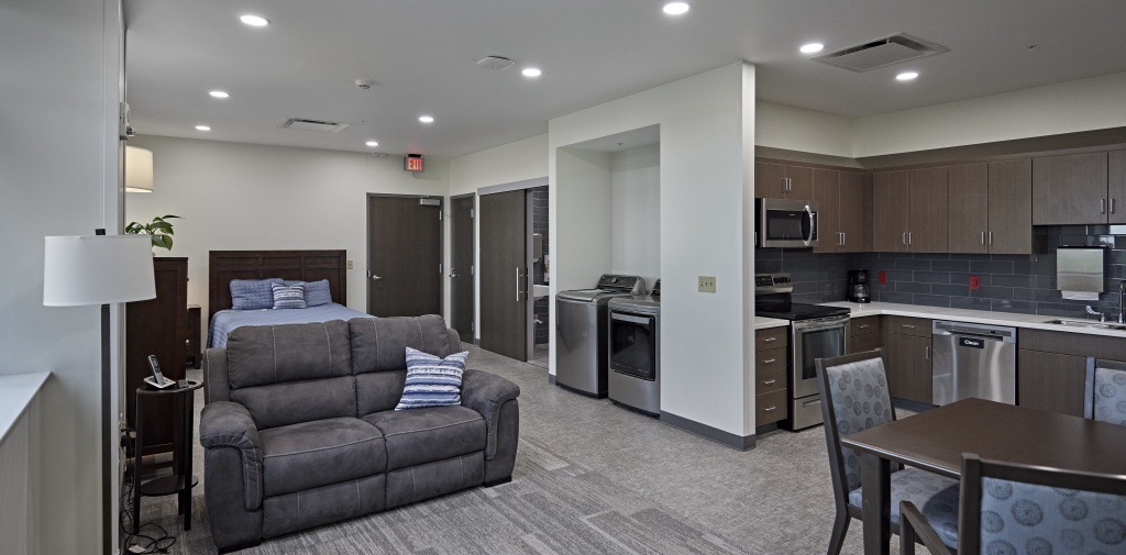 The interior of a furnished apartment that is used for patient rehabilitation and recovery.