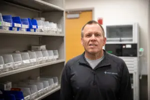 Man standing inside a pharmacy