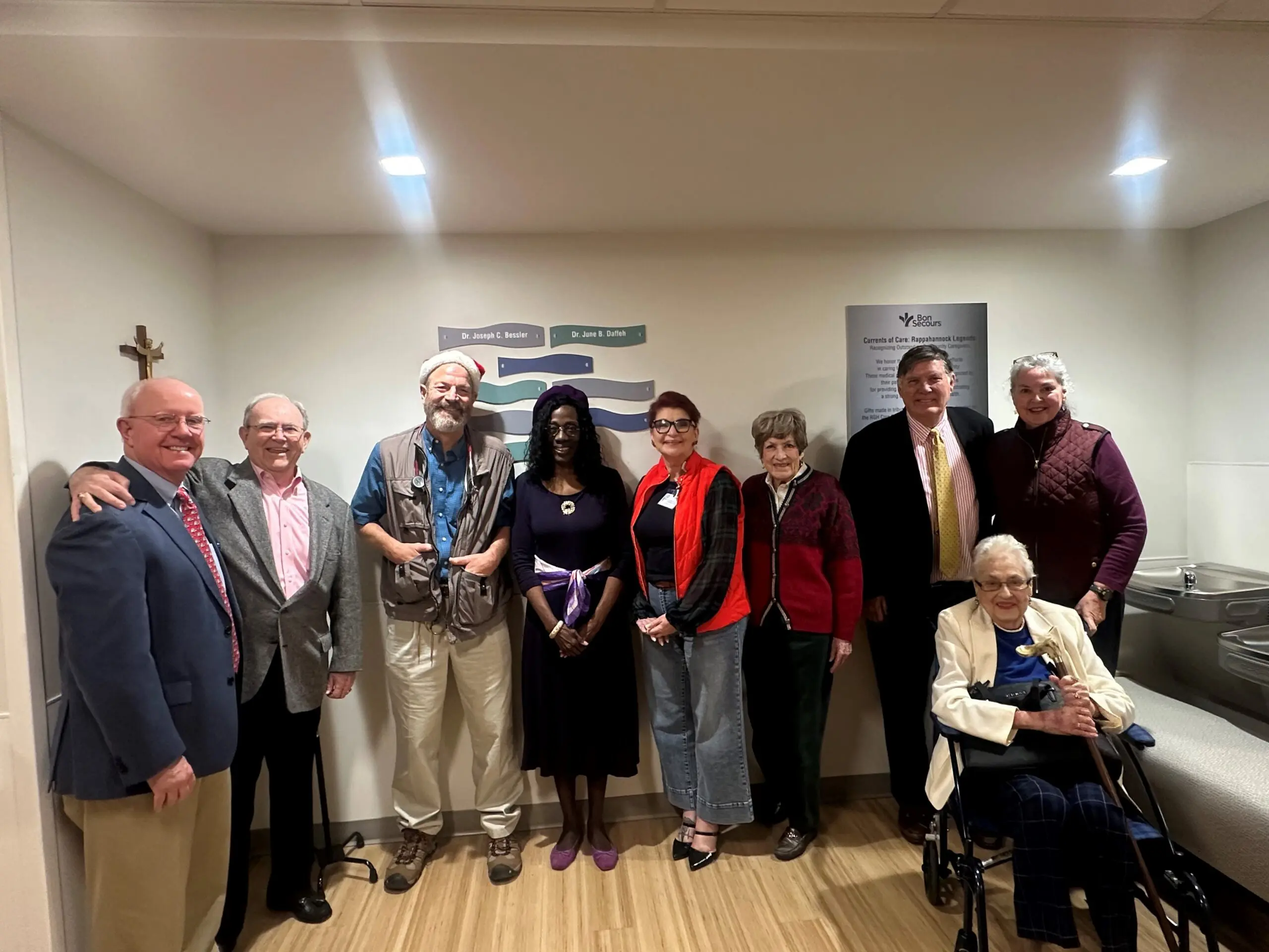 A group of people gather to celebrate inaugural honorees of Currents of Care Program