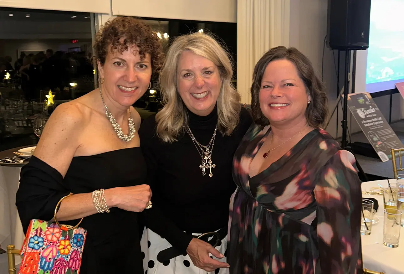 Laura Proto, Jamie Mazza, and Erin Spangler photographed at the Heart of Gold Memorial Gala