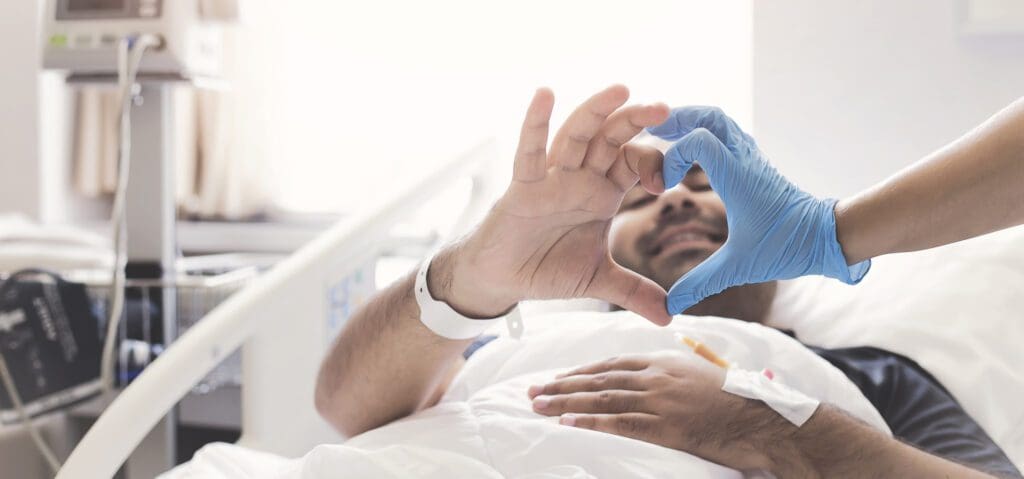 patient heart hands with doctor