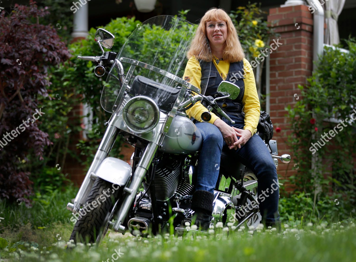Mandatory Credit: Photo by Chuck Burton/AP/Shutterstock (6210322b)
Crystal Swift Crystal Swift poses on her Fat Boy Harley-Davidson at her home in Charlotte, N.C. Harley is the top seller of motorcycles in its class in the U.S. and leads in sales among women, minorities and younger adults as well as the middle-aged men
Harley Davidson, Charlotte, USA