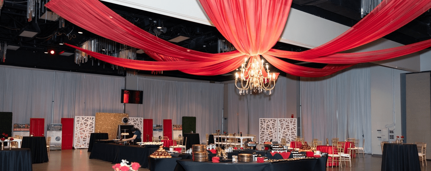 Red and white sparkly decor inside the 2023 Red Door Gala in Lima, OH.