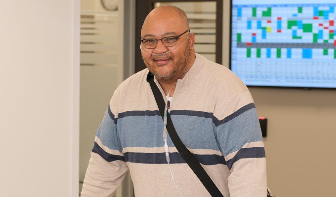 A man is pictured inside a physical therapy center.