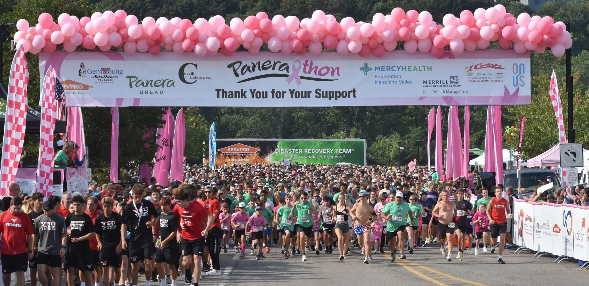 Runners take off from the starting line of the 2024 Panerathon in Youngstown, OH.