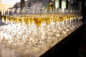 Champagne flutes beautifully arranged on a table