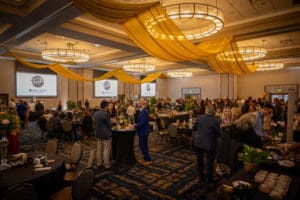 Guests mingling with each other in a ballroom