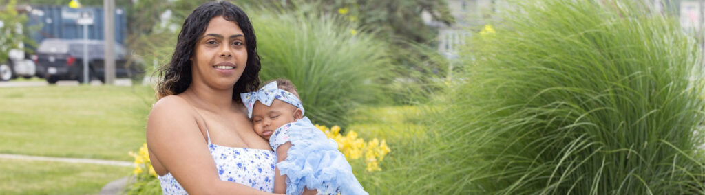 A photo of Alexis Ayala Williams and her newborn child