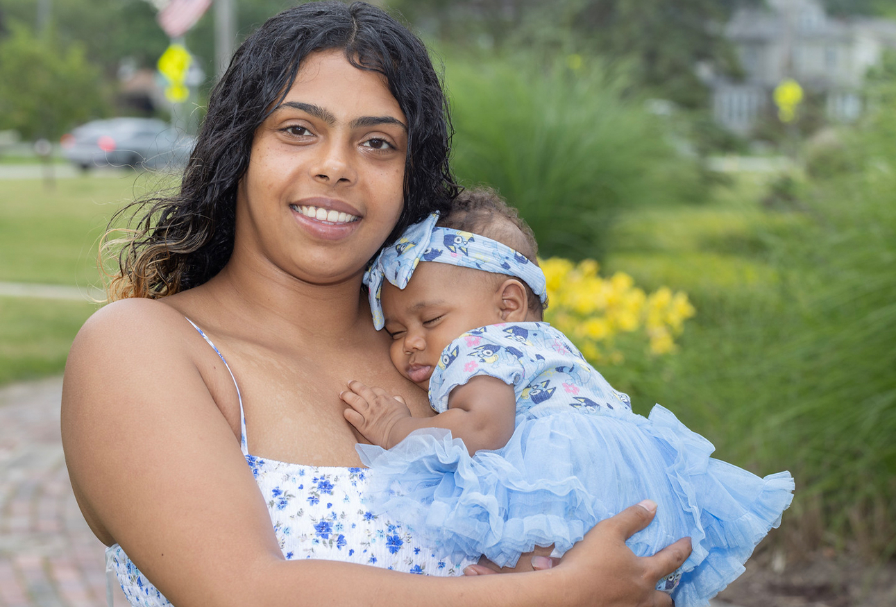 A photo of Alexis Ayala Williams and her newborn child