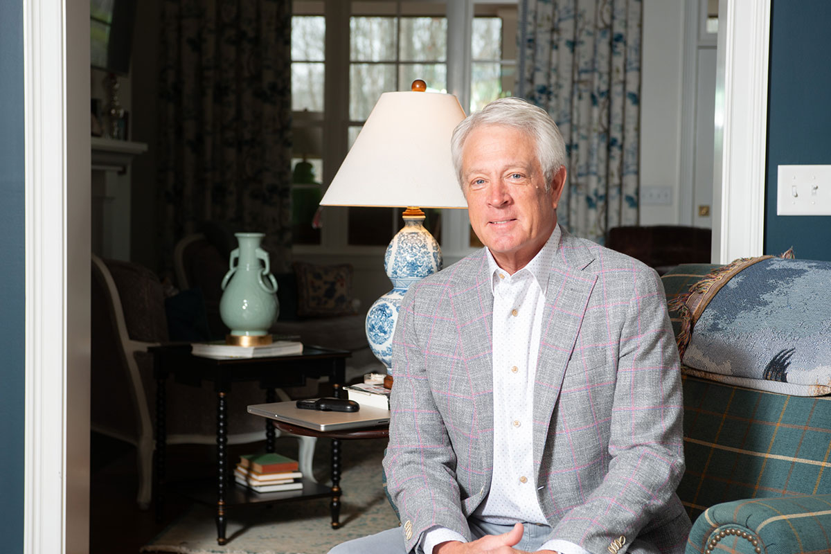 Paul Craven sitting in living room