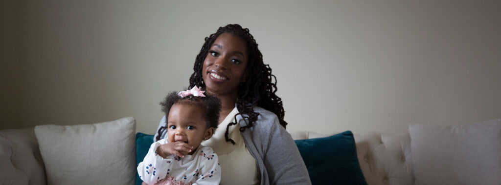 Kahdijah sitting with her daughter
