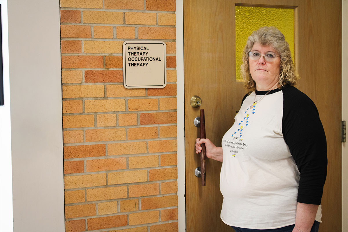 Connie standing outside physical therapy