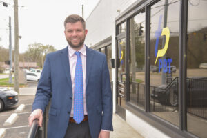 Justin Dixon standing outside