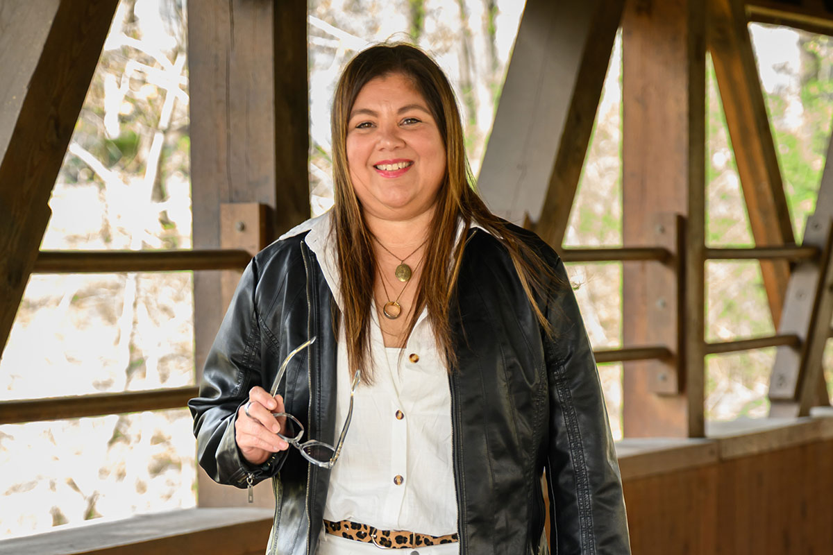 Ada Narvaez standing outside on bridge