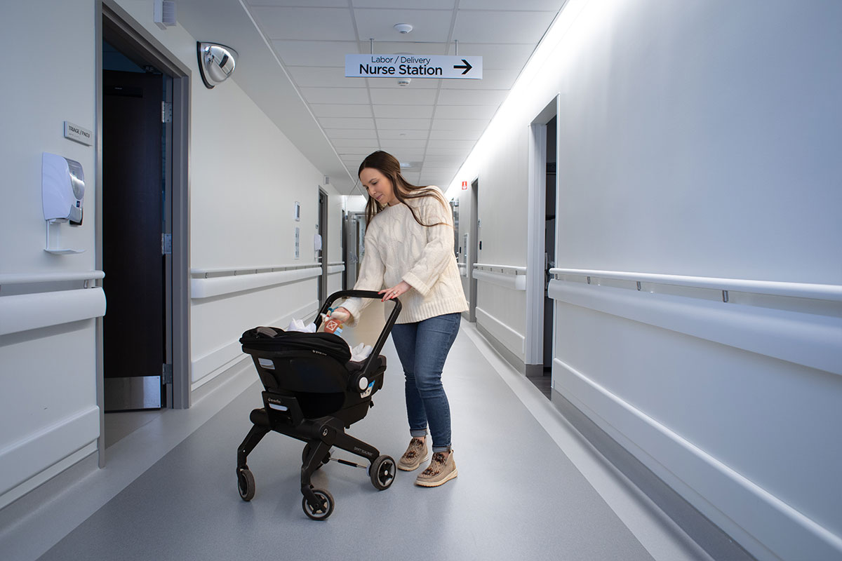 Mackenzie with her daughter and stroller