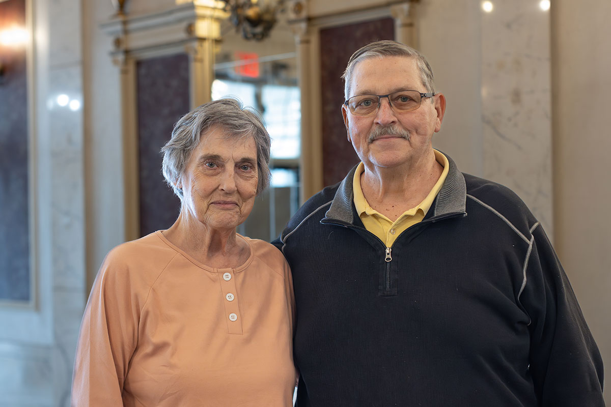 The Moores in a lobby
