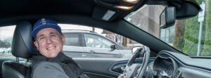 Justin Pfaff behind the wheel of a car