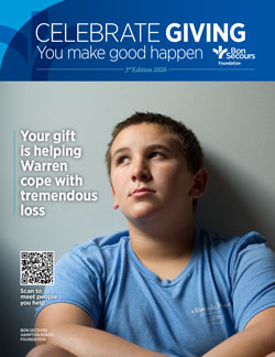 Poster promoting donations: a young man in a blue shirt looks up; text says 'Your gift is helping Warren cope with tremendous loss' with a QR code.