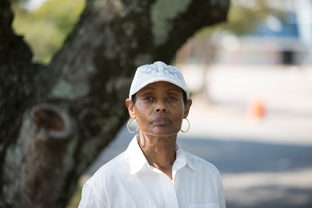 Headshot of Marie in her neighborhood