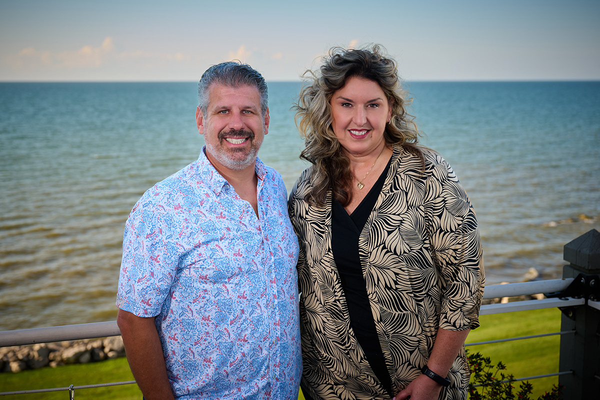 Headshot of Brian and Carrie at the Lake