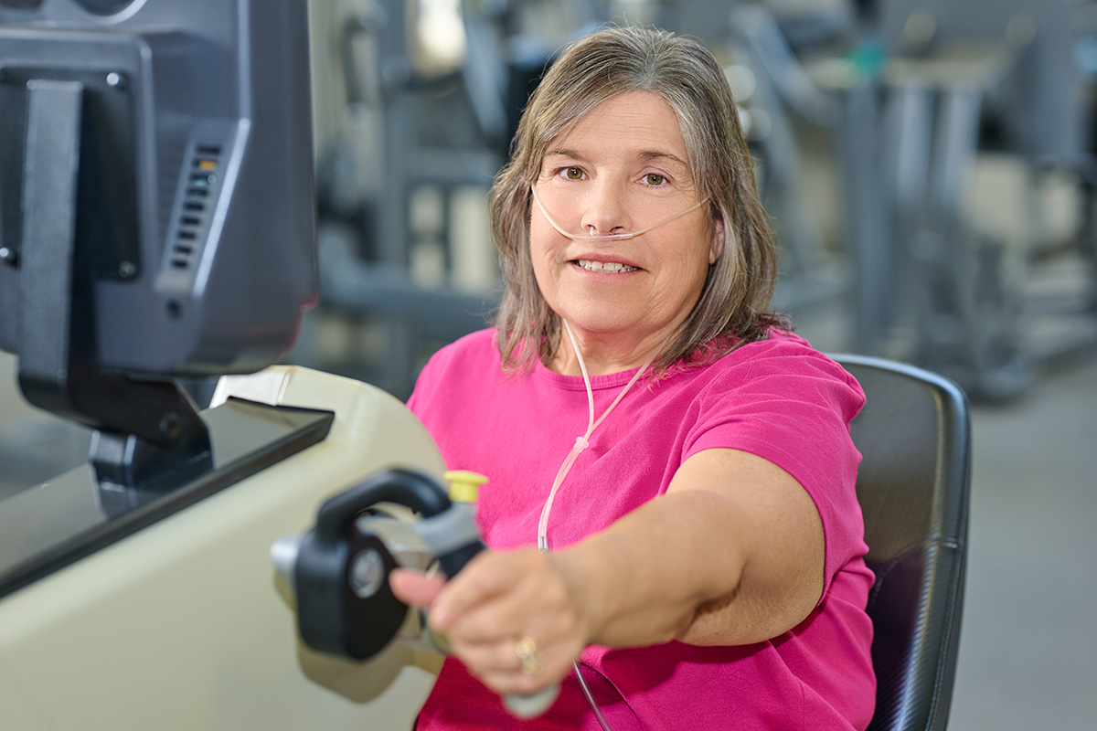 Headshot of Kathy Jenda working on her rehabilitation